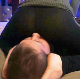 A woman smothers the face of some guy, then takes a piss and a shit while sitting backwards on a toilet. Presented in 720P HD. About 7.5 minutes.